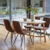Madrid, stilrent, ovalt spisebord i retrodesign, i heltre eik