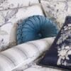 Rosanna, rund pute i mørk seaspray blå fløyel fra Laura Ashley