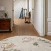 Gosford rundt blomstrete gulvteppe i salviegrønt fra Laura Ashley