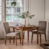 Highgrove rundt spisebord med ileggsplate i brunt tre